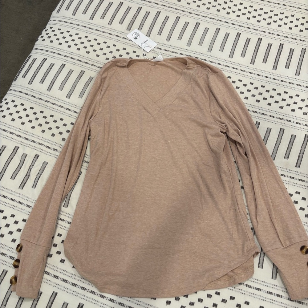 Brand new women’s fall top never worn, still has tags